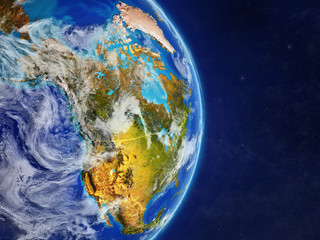 North America on planet Earth with country borders and highly detailed planet surface and clouds.