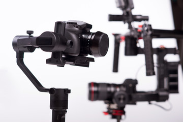 Sistem stabilization video camera and lens on steady equipment support such as gimbal steady or stabilized. White background
