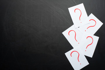 question marks on black background