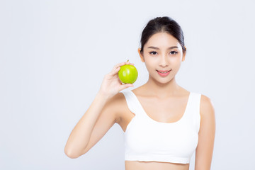 Portrait asian woman smiling holding green apple fruit and beautiful body diet with fit isolated on white background, girl weight slim with cellulite or calories, health and wellness concept.