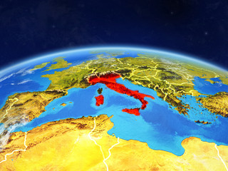 Italy on planet Earth with country borders and highly detailed planet surface and clouds.