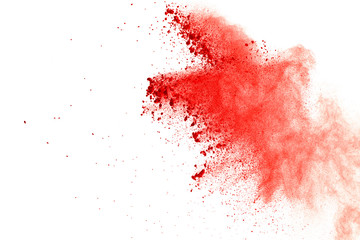Red powder explosion on white background. Paint Holi.