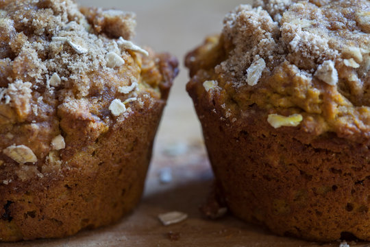 Pumpkin muffins on wood