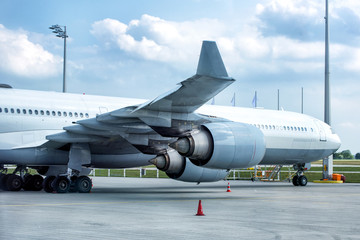 Close up view of aircraft's turbine at airport.