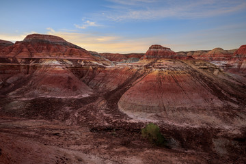 Rainbow City, Wucai Cheng. Colorful Red, Pink, Orange and Yellow landforms in the desert area of Fuyun County - Altay Perfecture, Xinjiang Province Uygur Autonomous Region, China. Rainbow Mountains