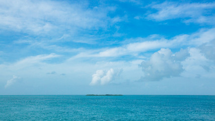 Island in the ocean under blue sky near Key West, Florida, USA