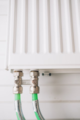 heating radiator with bottom connection pipes