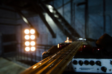 Red bass guitar close-up. Music instruments. Macro.