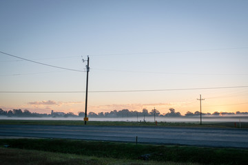 Fototapeta na wymiar empty road at sunrise