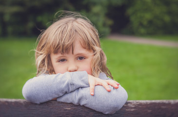 Portrait of a little sad  girl