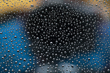 water drop on car window glass