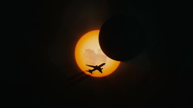 A plane passed across the sun during the initial stages of the eclipse.