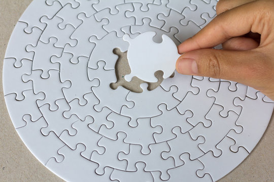 Jigsaw with one piece missing revealing,Comparative concept