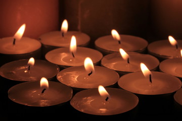 burning votive lights