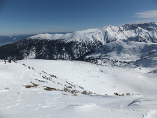 Fototapeta na wymiar Amazing Winter Panorama from Todorka peak, Pirin Mountain, Bulgaria