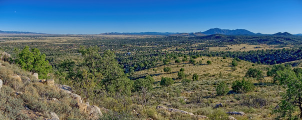 A panorama view of Chino Valley Arizona. This view is looking south toward Mount Union in the distance which is where Prescott is. This panorama is composed of 3 photos stitched together. © Deep Desert Photo