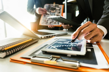 Two business meeting professional investor  working together with smart phone and laptop and digital tablet computer in office space