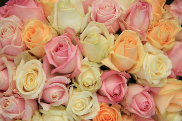 Pastel roses in a wedding arrangement