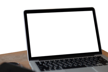 Fototapeta premium laptop blank screen on wooden table isolated on white background
