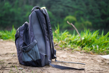 A Rucksack On A Ground With Nature Background