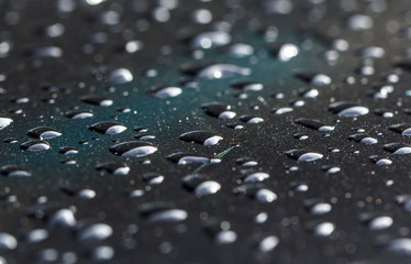 Drops of water on the surface of the walls black.