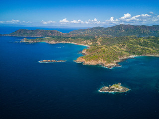 Fototapeta premium Aerial drone photo of the Pacific Ocean meeting the coastline of Costa Rica