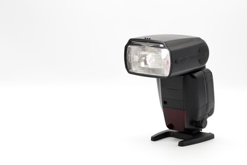 closeup camera flash on isolated background.