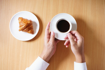 hand with coffee