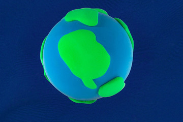 Plasticine blue and green Planet