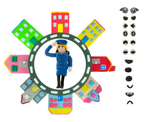 Town building and house on circle road made from plasticine