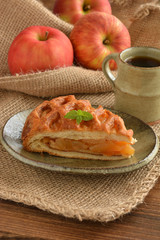 
Apple pie on a wooden table

