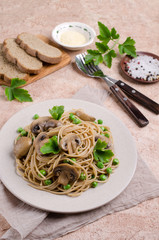 Dark pasta with mushrooms