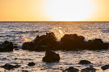 Colorful Beach Sunset with Crashing Waves