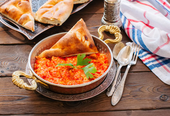 Turkish traditional breakfast - Menemen with scrambled egss, tom - 230552439