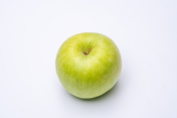 Green apple with white background close up