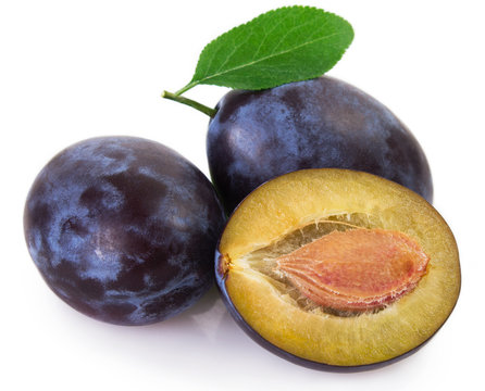 Fresh plum on white background