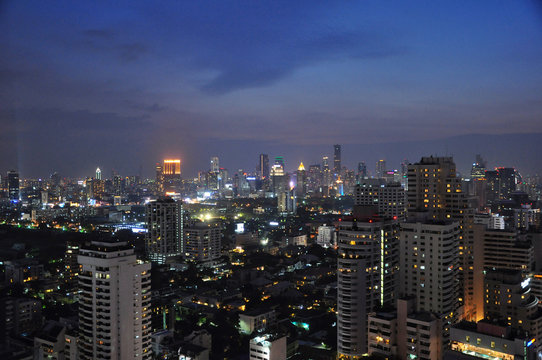 The night scene of Bangkok cityscape skyline in sukhumvit area. Photo from rooftop bar.