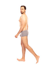 Fototapeta premium Man without clothes, in shorts, isolated on white background