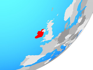 Ireland on blue political globe.