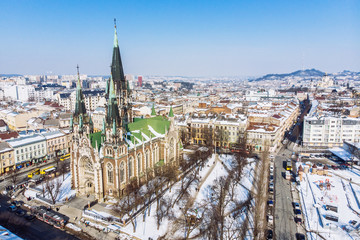 Fototapeta premium bird's eye view on old european church in winter day