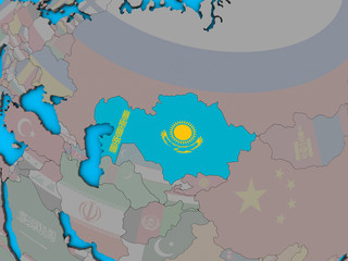 Kazakhstan with embedded national flag on blue political 3D globe.