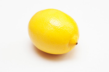 Ripe lemon on a white background