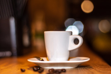 cup of coffee on wooden table