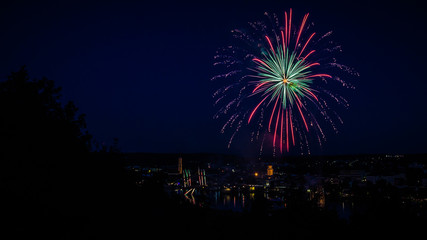 Fototapeta na wymiar Colorful bavarian fireworks - Danube in flames - Vilshofen - Bavaria