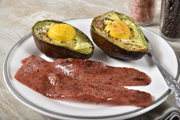 Baked avocado with eggs and bacon