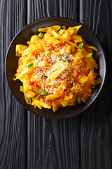 Cabbage Bhaji is a spiced stir fry from Goa, India closeup on a plate. Vertical top view