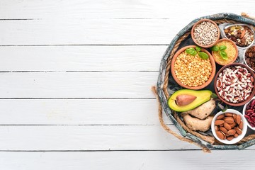 Various superfoods. In a wooden box. Top view. Free copy space.