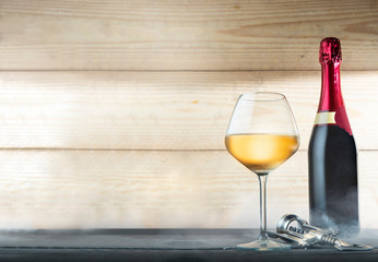 Wine bottle, glasses and corkscrew