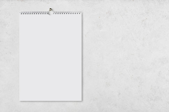Blank page of notebook on abstract wall with copy space