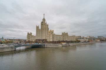 Obraz premium Moscow city image at the cloudy autumn day. The Stalin era house is very massive building